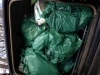 Green bags full of rubbish collected by the Barlaston Womblers